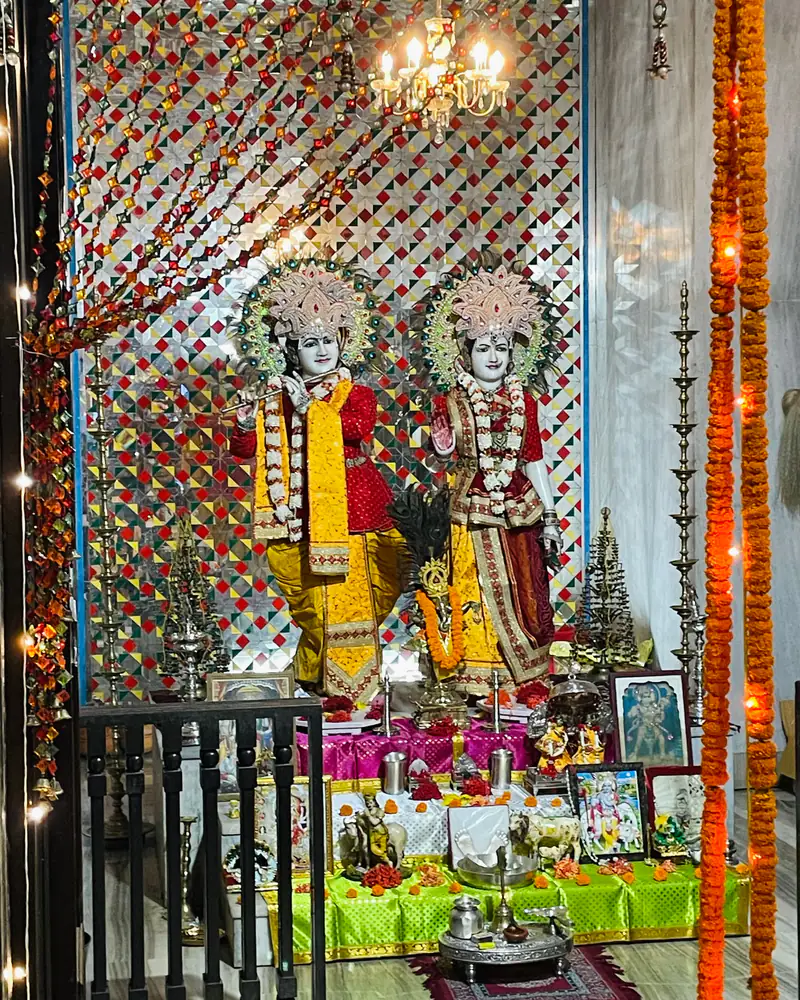 Radha Krishna idols dressed in bright poshak and shringar